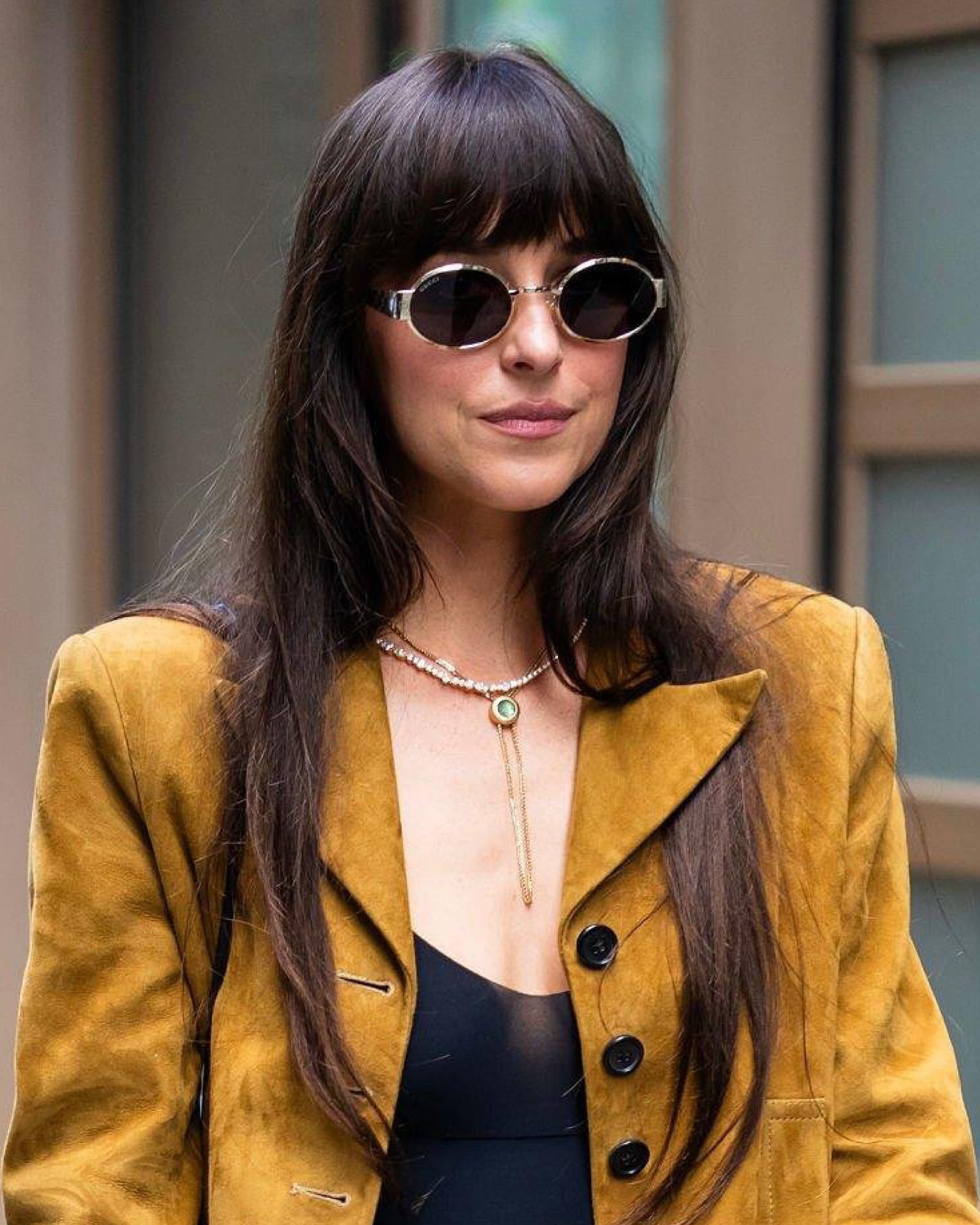 Actress Dakota Johnson wearing the Collier de Amis diamond tennis collier.