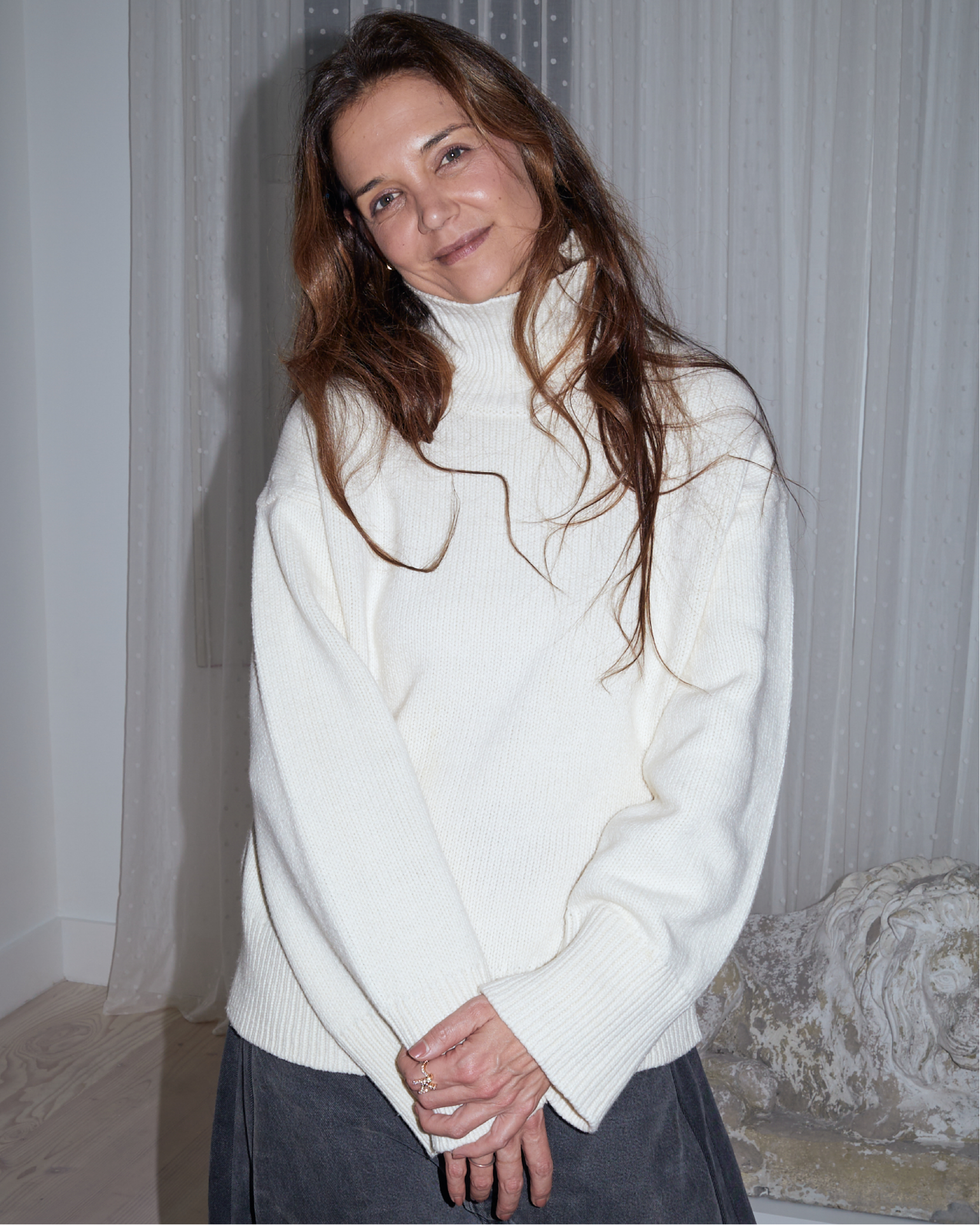 Actress Katie Holmes wearing the Ensemble K letter ring in our New York Boutique.