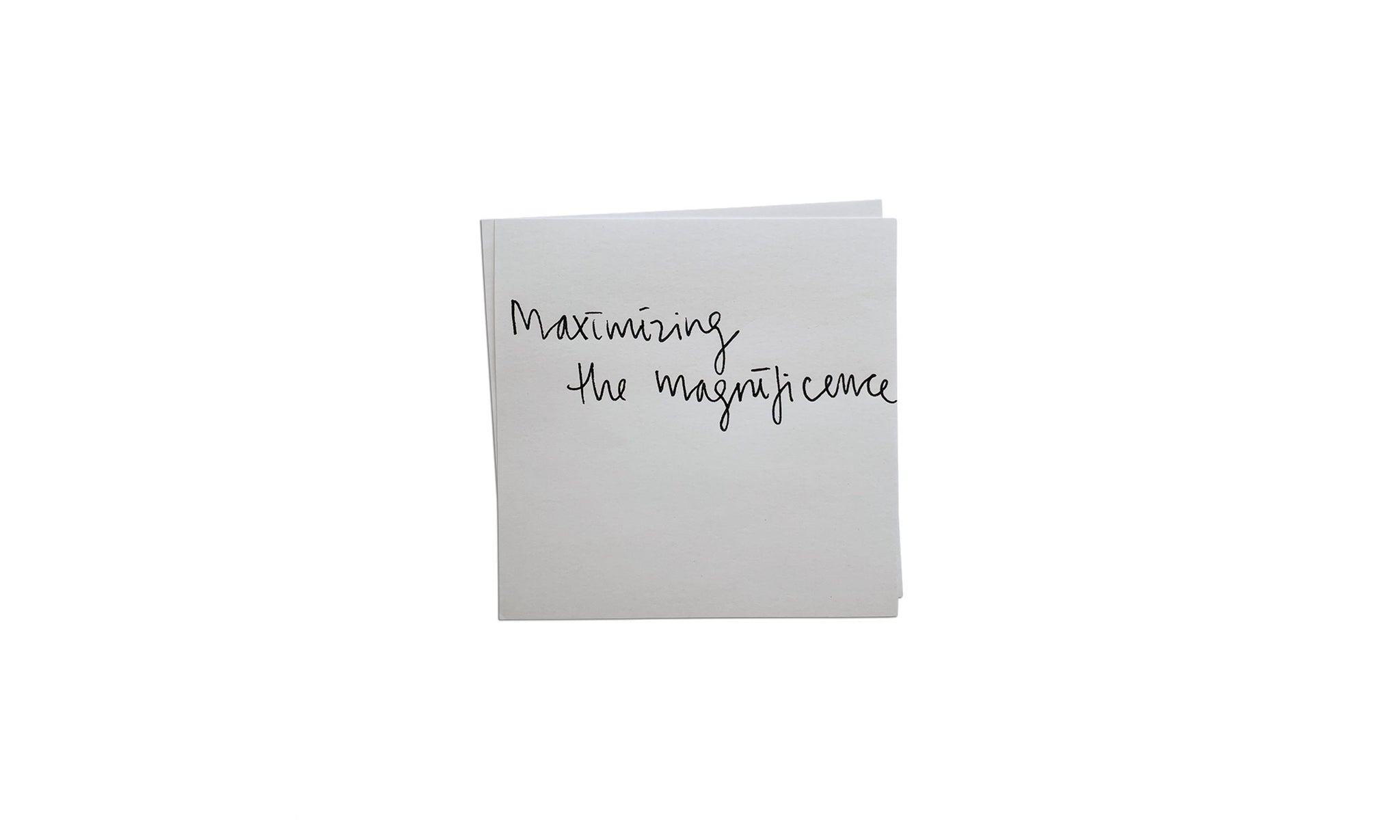 Handwritten note saying Maximizing the magnificence