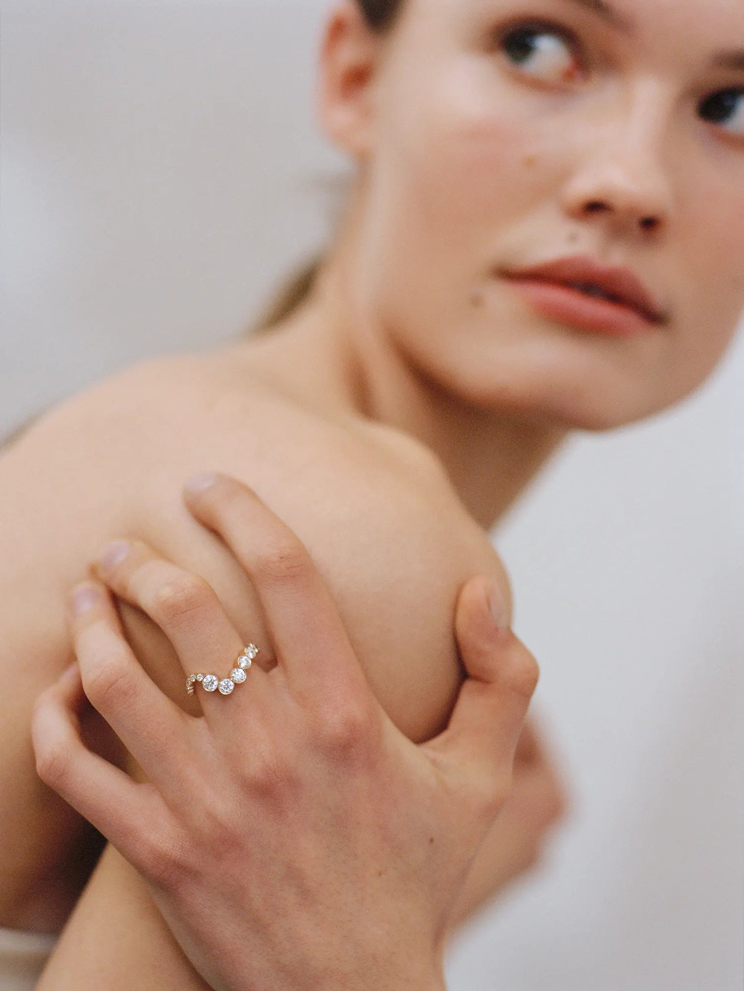 Model wearing Ensemble Ocean diamond ring from the Autumn and Winter 2019 collection