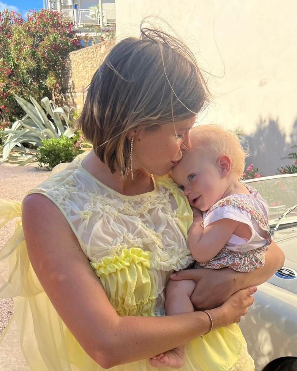 Emily Weiss is wearing the Sandro Grande long diamond earrings.