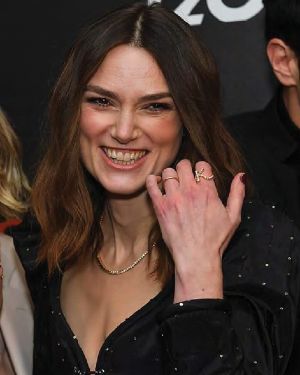 Actress Keira Knightley wearing the Ensemble K diamond letter ring and the Coeur de Tennis diamond necklace with heart shaped diamonds. 