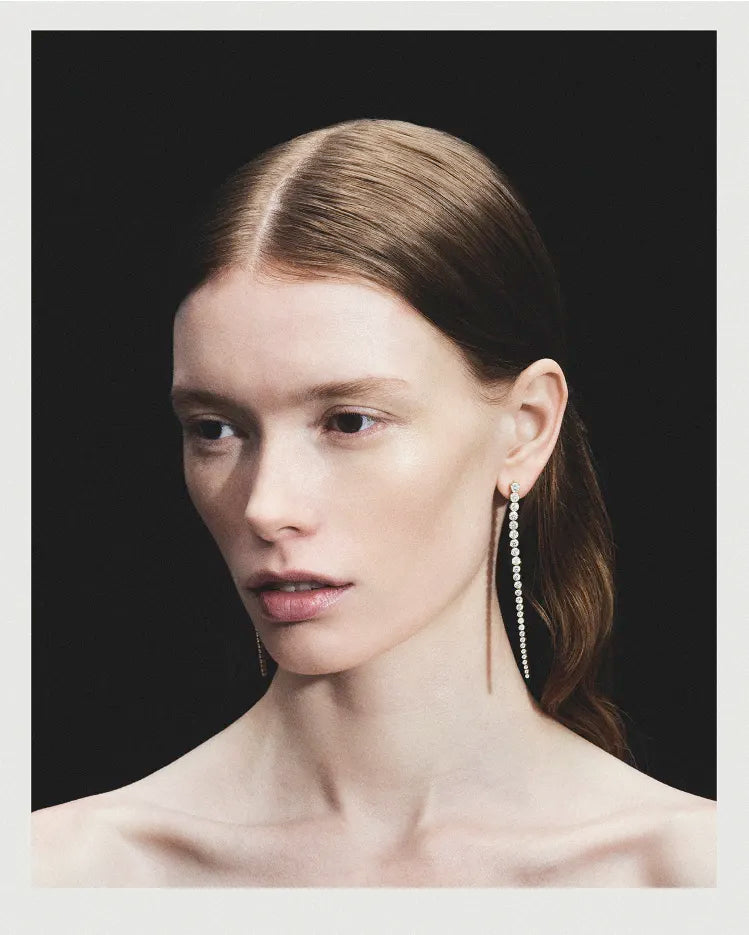 Model wearing Sandro Grande diamond earring