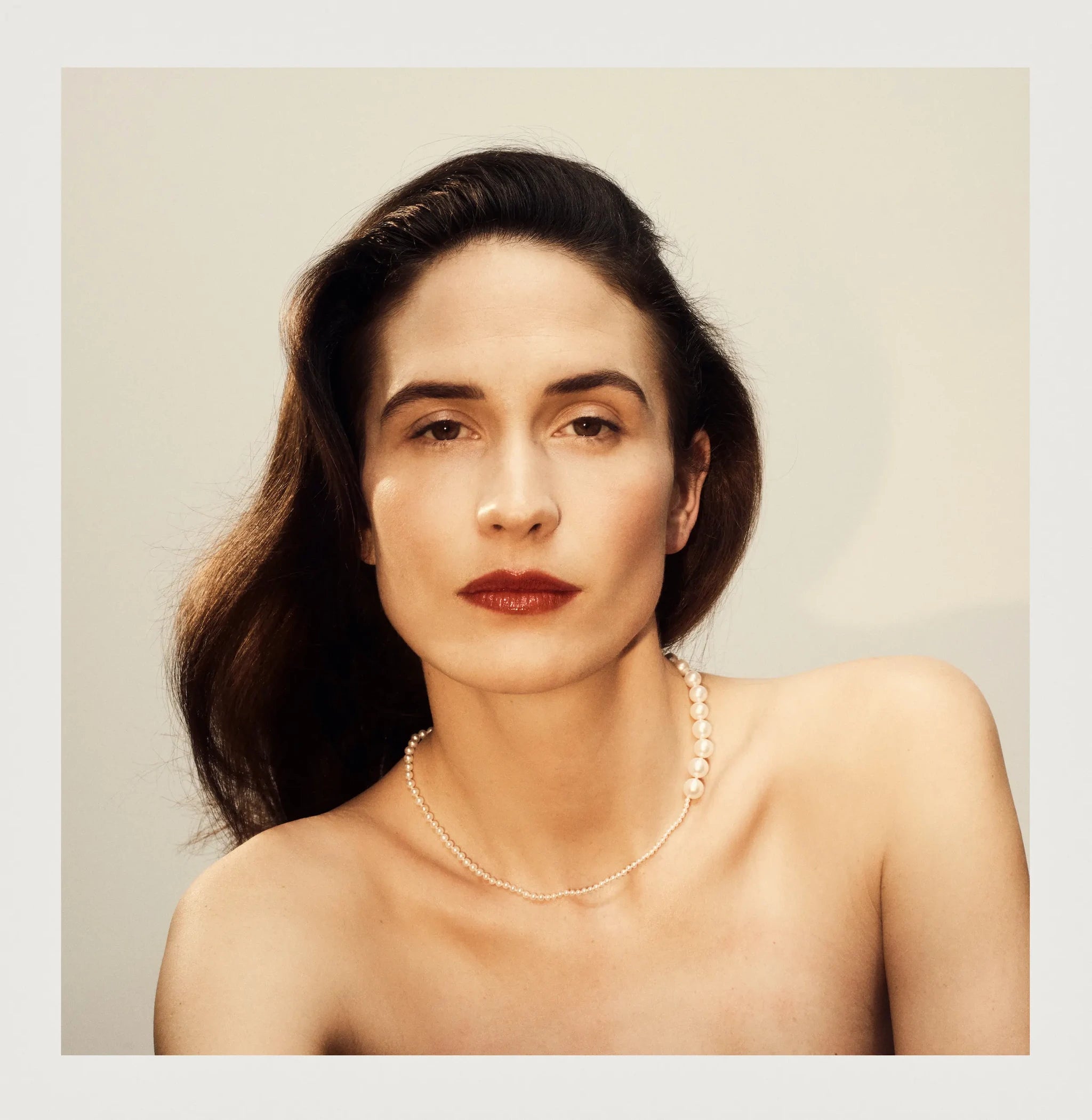 Model wearing Peggy Blanc pearl necklace from Sophie Bille Brahe's White Gold collection